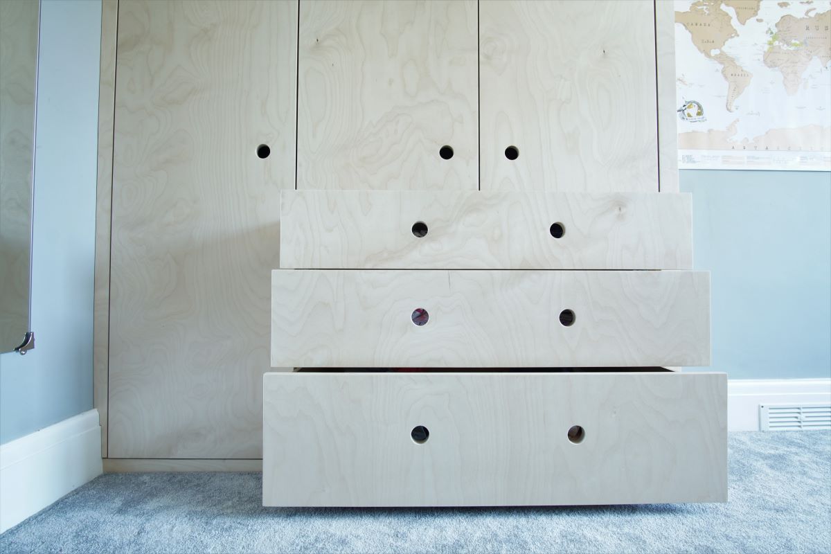 birch plywood contemporary wardrobe with big drawers and finger pull handle details