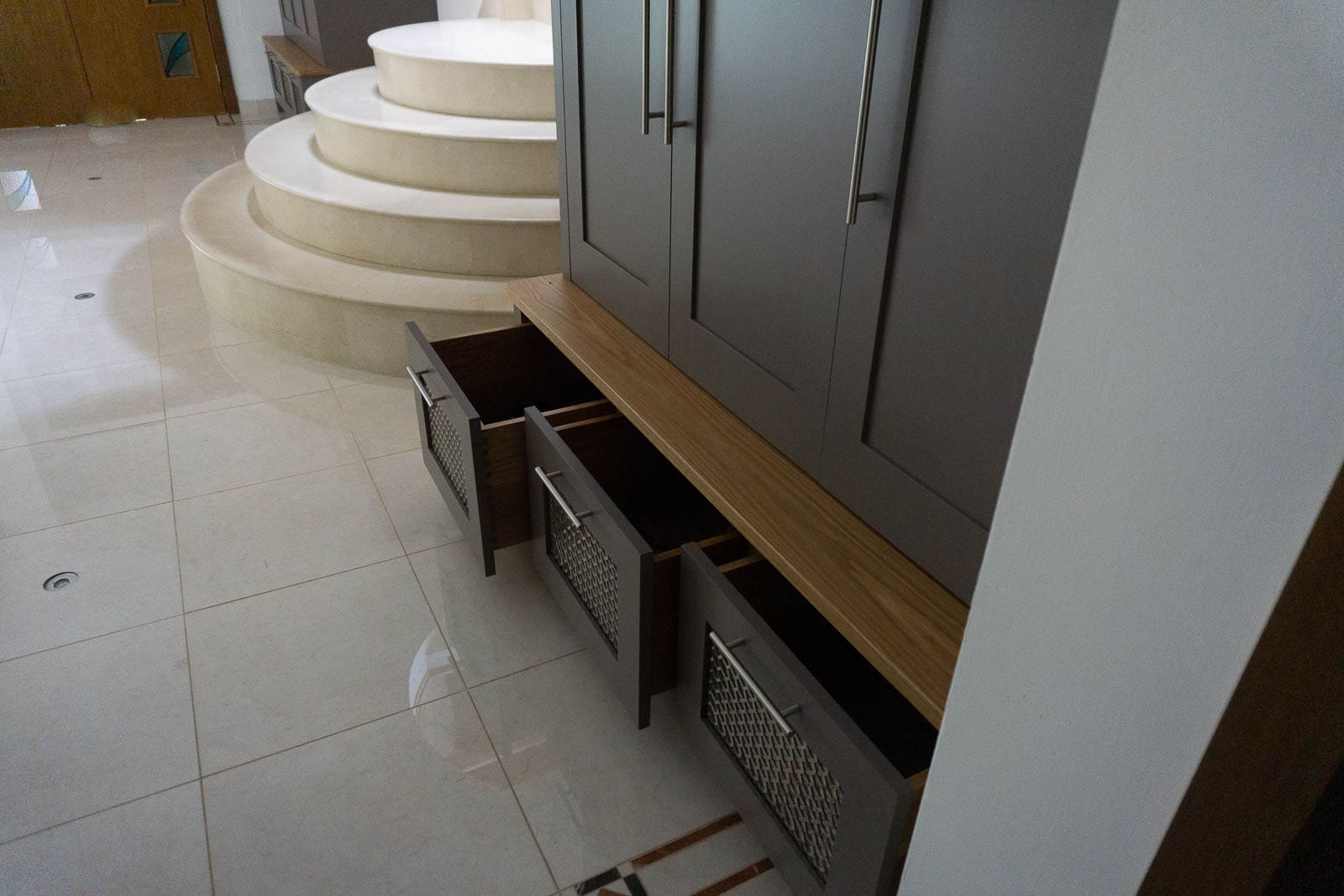 marble staircase and hallway cupboards