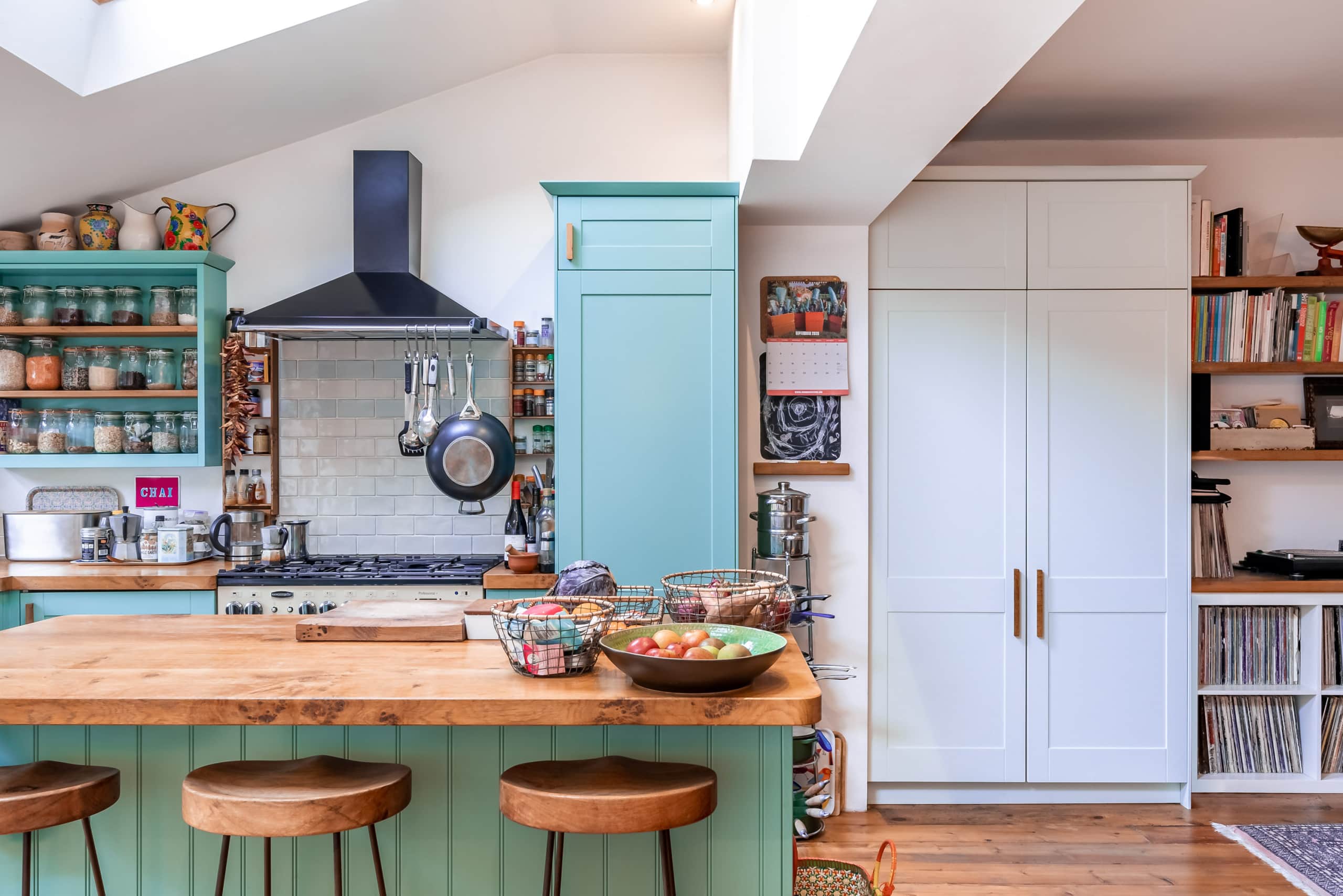 Bristol mint green handmade kitchen with oak worktop
