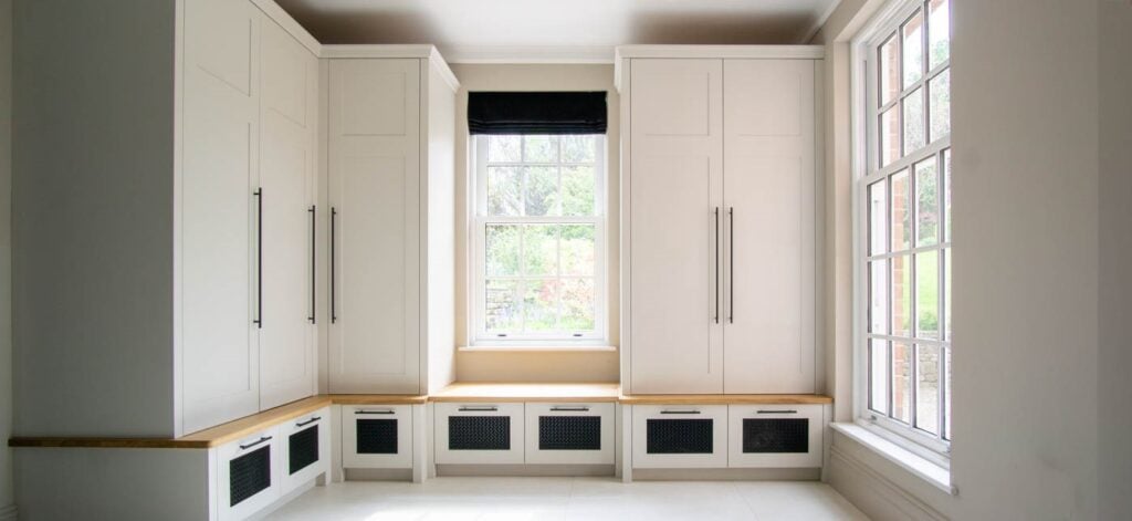 bespoke handmade boot room mud room farrow adn ball painted hallway cabinets