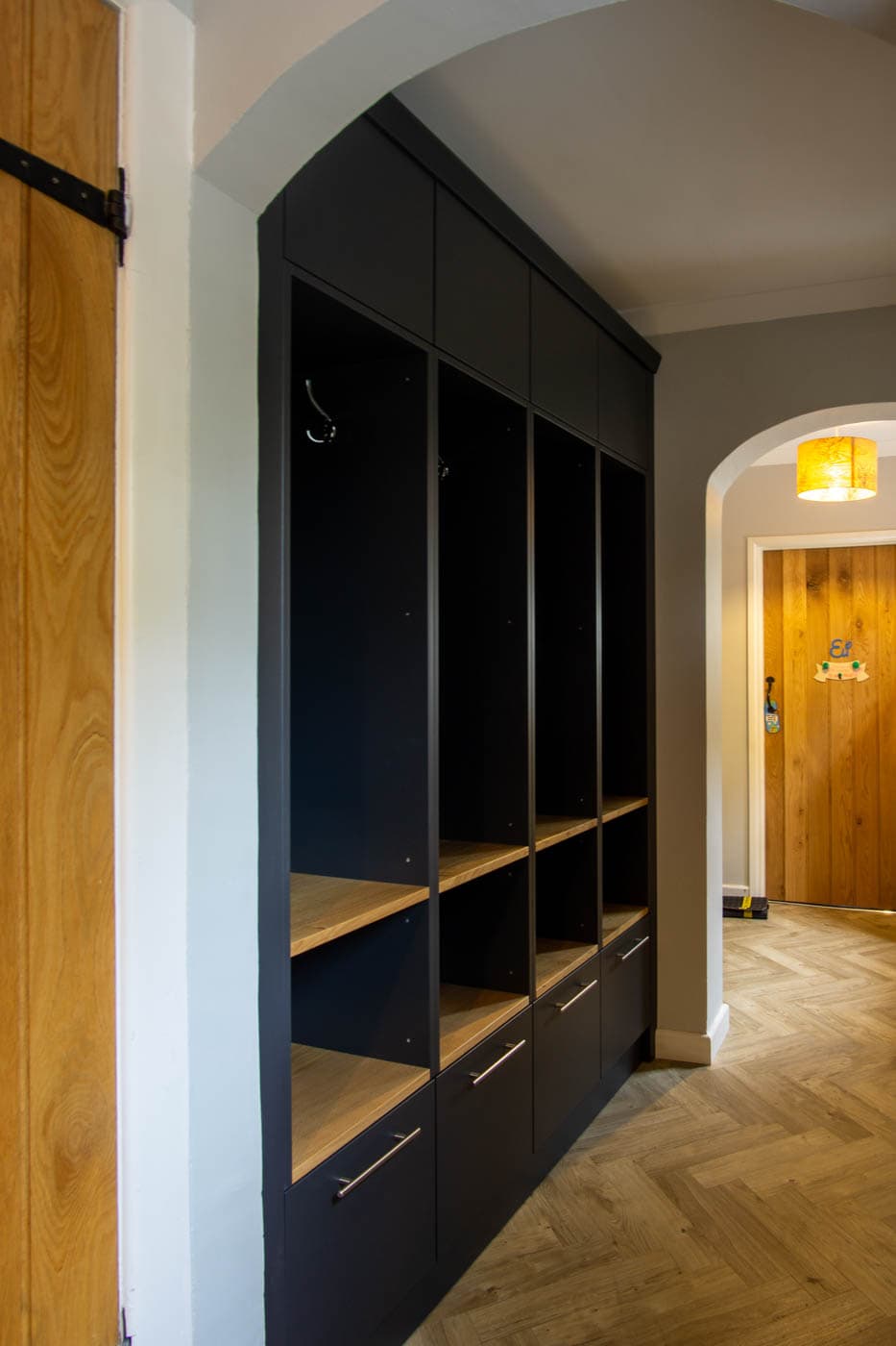 Bespoke boot room hallway cabinet oak dovetailed drawers and English oak shelves, hand-painted in Farrow & Ball's 'Railings'
