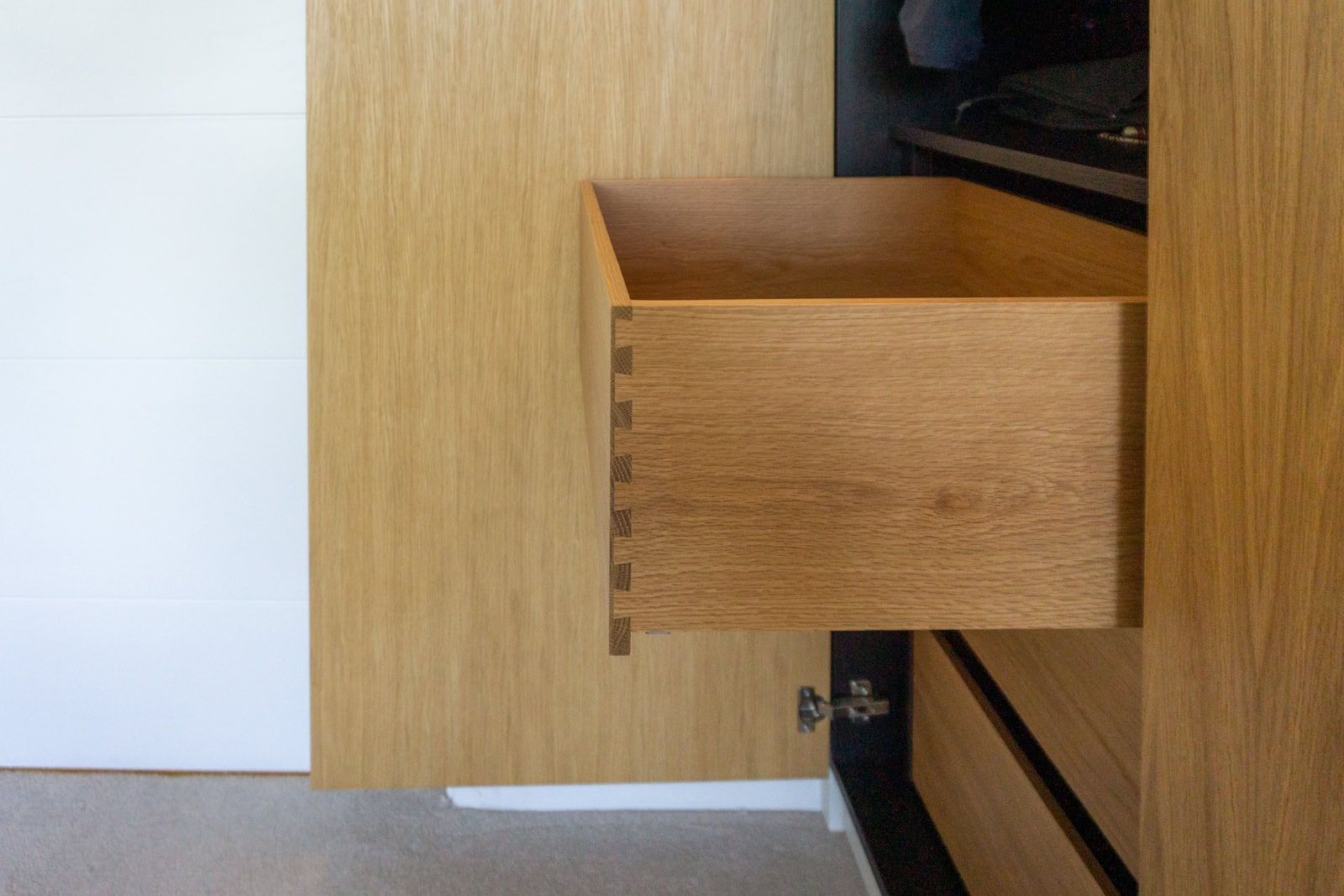 Oak dovetailed wardrobe drawers on full-extension runners with lifetime guarantee